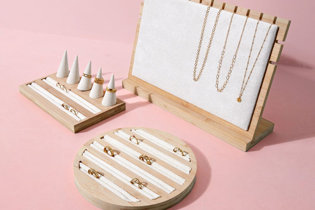 Jewelry display stands and trays arranged on a retail counter